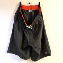 DISCUS ATHLETIC】メンズ ショートパンツ グレーレッドのサムネイル
