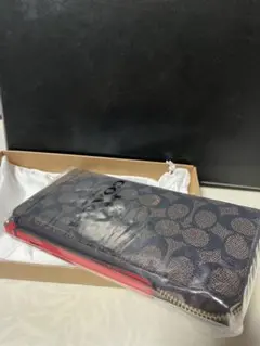 COACH 長財布 シグネチャー柄