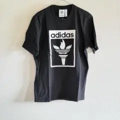 adidas Originalsアディダス Tシャツ 聖火 トレフォイル 黒