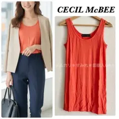 新品 セシルマクビー タンクトップ オレンジ M トップス キャミソール 差し色