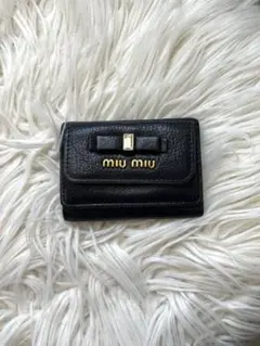 miumiu ミュウミュウ 三つ折り財布 黒 リボン クリスタル ミニウォレットのサムネイル