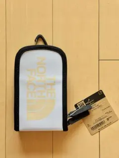 THE NORTH FACE ナイロンポーチ ホワイト/ゴールドのサムネイル