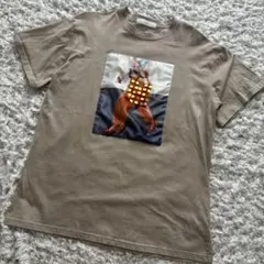 ベージュ グラフィックTシャツ　個性的　おしゃれ　ながめ　ゆったり　体型カバーのサムネイル