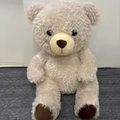 ベージュのクマ型ぬいぐるみ 中型