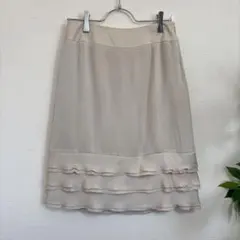 インディヴィ INDIVI フレアスカート　膝丈　フリル　ベージュ　無地　上品