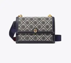 Tory Burch ピンクカメリア リュック - メルカリ