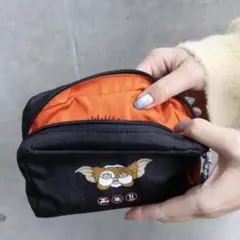 グレムリン　リバーシブルポーチ　クロ　オレンジ　アコモデ　ACCOMMODE