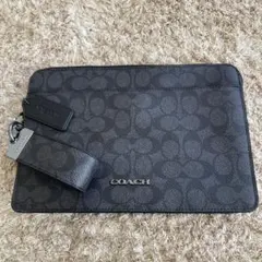 COACH ブラック パターン クラッチバッグ