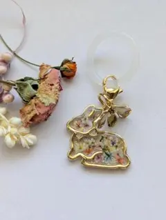 ハンドメイド レジン 犬花ヘアゴム - メルカリ