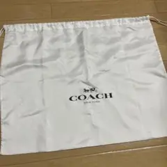 COACH ロゴ入り ホワイト収納袋