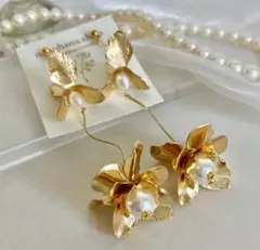 (creemaの人気10)ブライダルアクセサリー フラワーウェーブのパールピアス