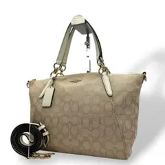 美品　コーチ　ハンドバッグ　2way　茶　シグネチャー　ロゴチャーム　s1