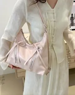 リボン付きピンクショルダーバッグ