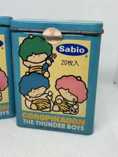 昭和レトロ Sanrio GOROPIKADON ゴロピカドン 空ケース 缶 - メルカリ
