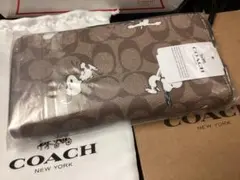 保存袋付き未使用未開封コーチCOACH 長財布 スヌーピー柄本物のサムネイル
