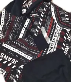 新品未使用タグ付き Tommy JEANS 総柄限定フードパーカー