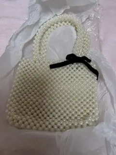 ナイスクラップ　ノベルティ　ホワイトパールバッグ