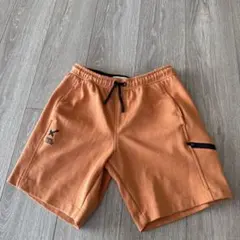 zara オレンジ色ポケット付きショートパンツ