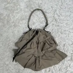 GUSCIO グッシオ 2WAY ショルダーバッグ フリル 巾着 グレージュのサムネイル