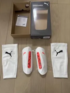 PUMA ULTRA シンガード ホワイト/オレンジ