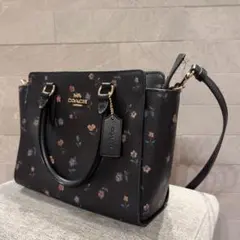 COACH ブラック フラワープリント ショルダーバッグ