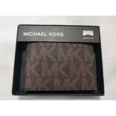 【新品】上品で希少！マイケルコース　シグネチャー柄　スリムウォレット　ブラウン