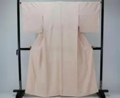 お仕立て上がり正絹無地　薄いコーラルピンク　楓柄　五七桐染め抜き紋一つ紋