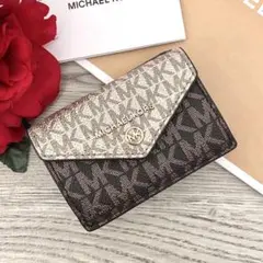 《新品》MICHAEL KORS 折り財布　レザー ゴールド シグネチャー