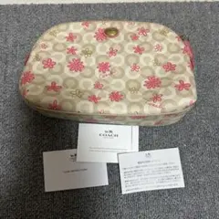 新品コーチ　花柄ポーチ