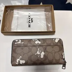 値下げ新品 COACHコーチ スヌーピー シグネチャー柄ラウンドジップ
