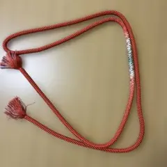 オレンジの変わり編みの帯締め　タグなし未使用品引っかき傷あり