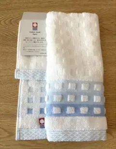 【新品　未使用〕今治タオル（白と水色の可愛い柄ハンドタオル）