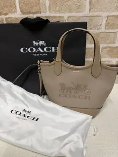 COACH ハンナ バケット バッグ・ホース アンド キャリッジ プリント