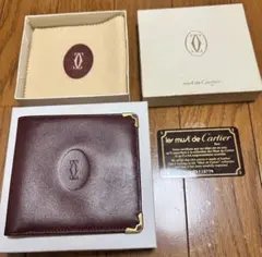 Cartier バーガンディ 二つ折り財布　未使用品のサムネイル