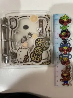 ま*ん様 Hello Kitty ヒョウ柄リボンバインダー