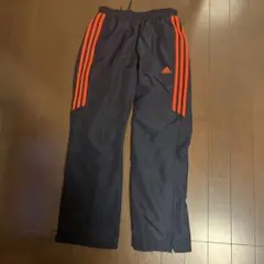 adidas 3本ライン ジャージパンツ 黒/オレンジ 152