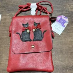 猫の赤いショルダーバッグ