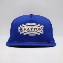 90s USA 企業ロゴ ビンテージ メッシュ キャップ BRATTON 青