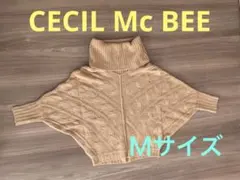 ニット コーラルピンク ケーブル編み タートルネック セーター