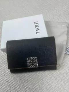 田中LOEWE 三つ折り財布 ブラック 保存袋付き LOEWE 三つ折り財布 ブラック - メルカリ
