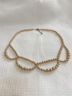 パールネックレス　ピンクゴールド系の色