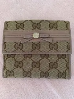 正規品.GUCCI 可愛いデザイン.GGキャンバス 二つ折り財布 リボンのサムネイル