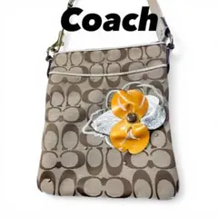 COACH ショルダーバッグ シグネチャー フラワーモチーフ ベージュ