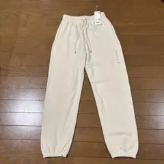 新品タグ付きUNIQLOのスウェットパンツ（S）　クリーム色