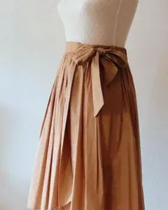 ベージュ リボン付き フレアスカート