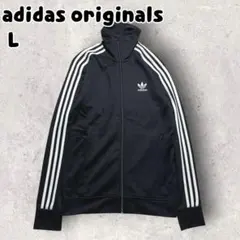 90s adidas アディダス　トラックジャケット　ブラック　黒　万国旗タグ adidas ブラック トラックジャケット 90s 銀タグ 万国旗タグ - メルカリ