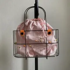 ドライフラワー付きピンク巾着バッグ