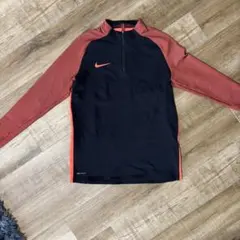 NIKE ハーフジップ ジャージ ブラック オレンジ - メルカリ