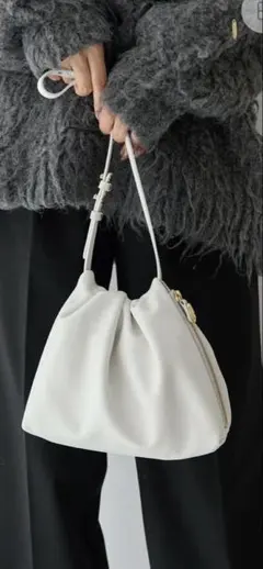 UND BIJOU DRAWSTRING BAG - メルカリ