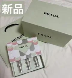 PRADA リップバーム 3本セット ショッパー付き - メルカリ